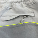 syna_world_team_pipe_shorts_grey_volt_green_3