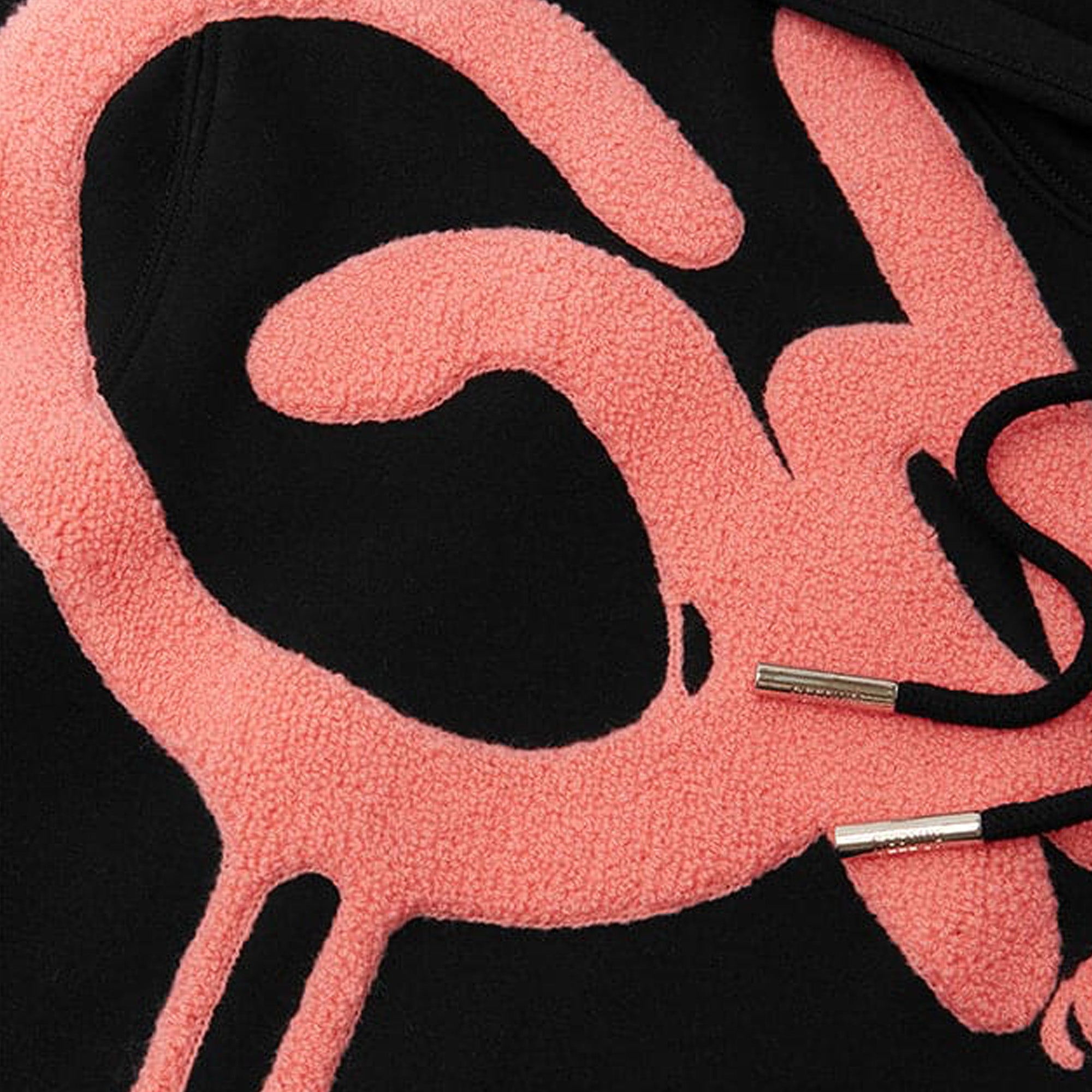 Geedup-Handstyle-Hoodie-'Black-Peach'-(2024)-logo-close-up